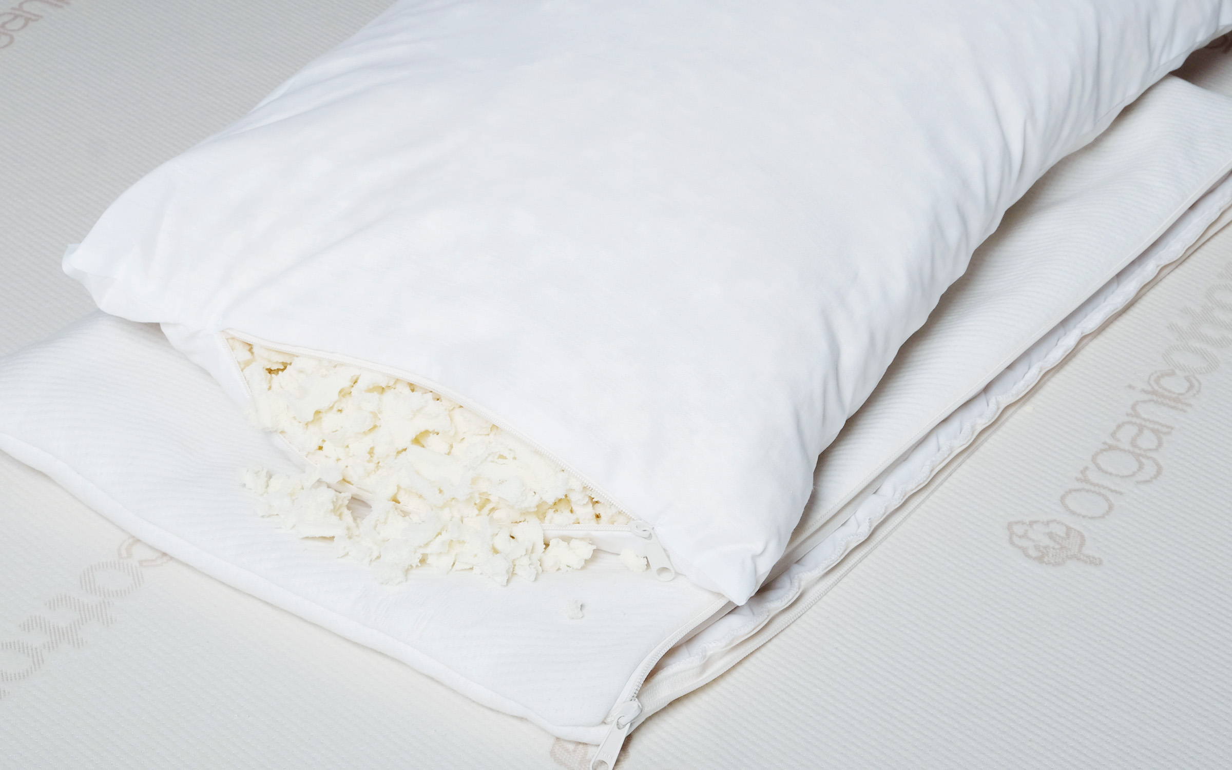 Natural shredded latex pillow allows for easy adjustment for firmness and loft.